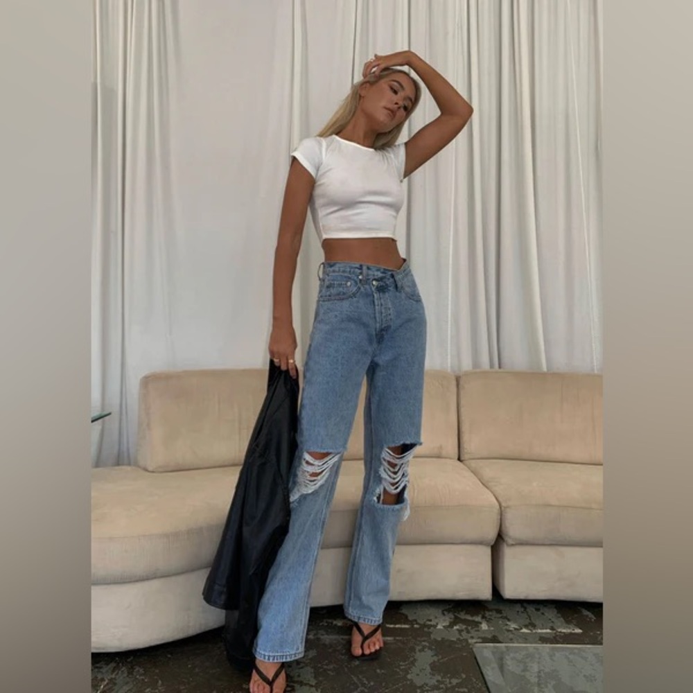Princess Polly HOLLY Highrise ASYMMETRIC RIPPED LEG JEANS LIGHT WASH DENIM